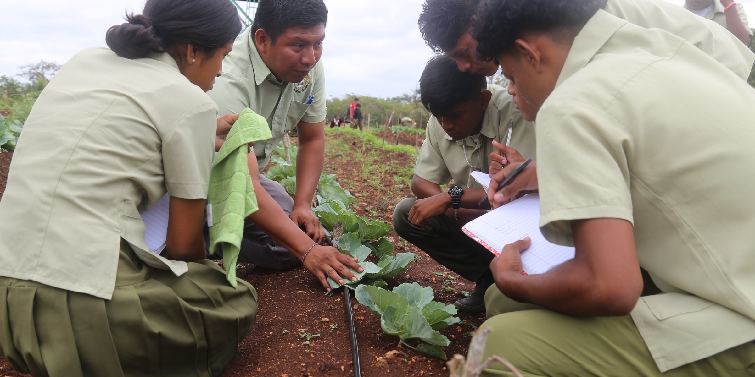 Students with their teacher during a lesson. Credit: World Bank