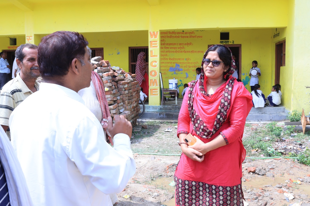 Principal Jameela Khatun interacting with parents engaged in the School Management Committee at the Shree Janata Rashtriya Primary School in Bode Barsain Municipality in Saptari District in Nepal's southern plains. Credit: UNICEF/UNI448474/Laxmi-Prasad-Ngakhusi