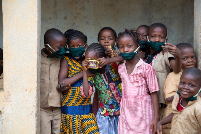 Children playing in front of their classroom in Guinea. Credit: UNICEF Guinea